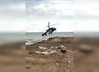A helicopter loses its tail in flight and everything is turned upside down