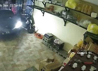 He pushes his attacker back to escape the robbery.