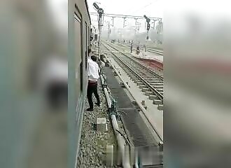 He tries to steal a phone from a train window, the victim grabs his arm  