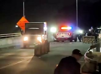 Idiots try to break through a police roadblock, their truck is riddled with bullets