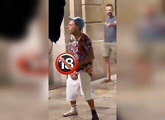 A pervert jerks off in the street in Barcelona, receives a double surprise from behind