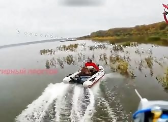 Russian drone abandons last-minute attempt to strike father and son in boat