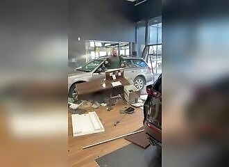 Man drives car into dealership after refund refused