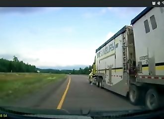 Truck driver collapses and crosses freeway