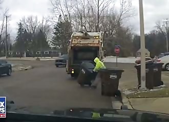 He hides in a trash can to escape the police... a garbage collector betrays him.