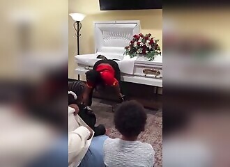 WTF: woman twerks in front of a coffin at a funeral