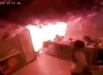 She burns a cup of coffee while trying to put out a small deep-fryer fire