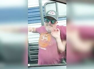 A Canadian tries to break an American's window with his fist