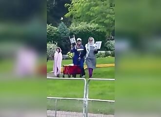 Muslim Woman and Children Wearing Swastikas Tour Jewish Neighborhood in Toronto