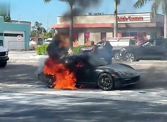 Man rescued from burning Porsche
