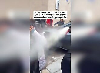 Immigration officer gasses protesters at point-blank range 