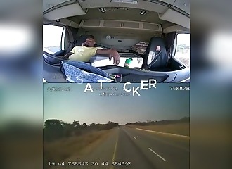 He falls asleep at the wheel for a minute, crashes, and calmly exits the cab.