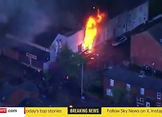 Nighttime footage of the fires in Belfast following the stabbing that has shocked the world