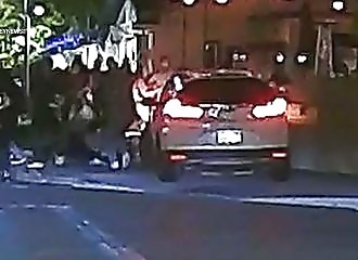  2 women drive into a group of people trying their hand at drifting 