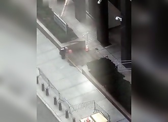 This man was subdued after setting fire to the building's entrance