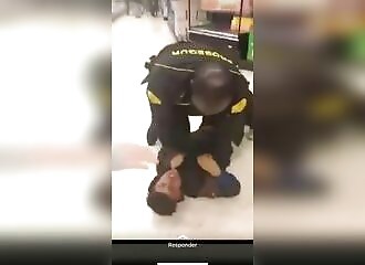 A security guard surprises and neutralizes a thief attempting to escape