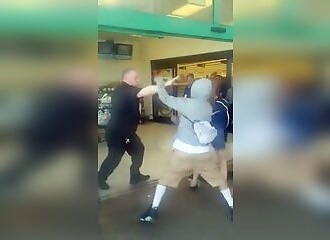 A store clerk fights off a group of riffraff