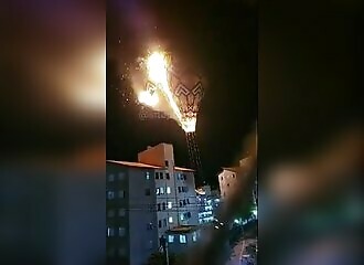 A burning hot-air balloon crashes into a building in Brazil