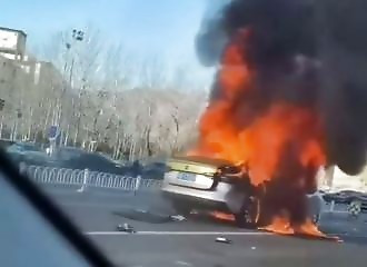 The trunk of a cab explodes on the street in China