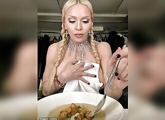Madonna photographed naked eating soup