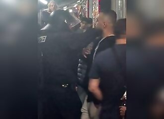 An argument between a German policeman and a pro-Palestinian degenerates