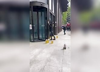 Transsexuals throw urine in front of a British government building