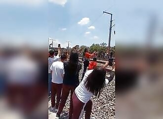 Woman hit by speeding train while taking selfie (Warning - shocking)