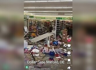 Car drives through Dollar Tree store in Milford