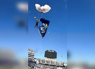 A parachutist falls 10 meters during a US soccer match