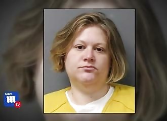 After having sex with her pit bull, she hangs her two children on the dog's leash