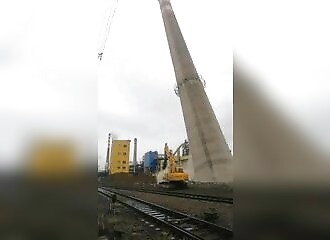 Demolition of an industrial chimney does not go as planned