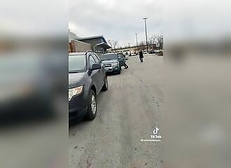 Clumsy thief tries to steal a TV from Walmart and loses a shoe when she falls out of the car
