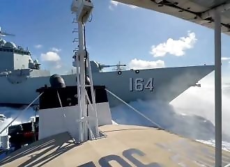  A Chinese navy destroyer collides with a coastguard patrol boat
