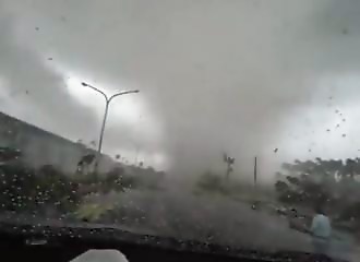 A tornado makes a car disappear