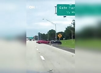 Moron loses control of a powerful car and crashes into another vehicle
