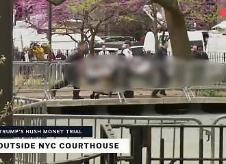 A protester sets himself on fire on the sidelines of Trump's trial