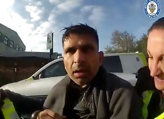 He tries to escape by smashing police cars 