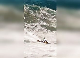 Wow, look how this lifeguard gets a surfer out of trouble!