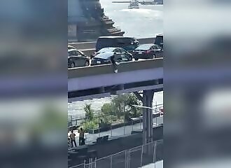 He tries to escape by jumping off a bridge - bad idea!