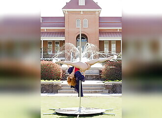   She celebrates her graduation by pole dancing in front of the university  