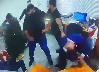 A gang beats up the managers of a hotel because they fired a person from their neighborhood