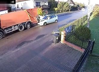Moron plows into garbage truck and injures garbage collector