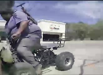 A man drives his quad bike into Tesla cars 