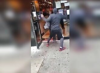 Two men get into a knife fight outside a pizzeria (Warning - shocking)