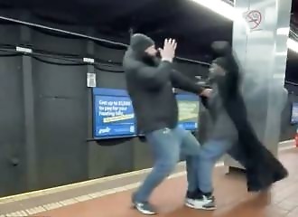 He drops a man on the subway tracks before a train arrives