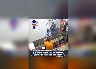 Brazilian policeman beats violent son in bar
