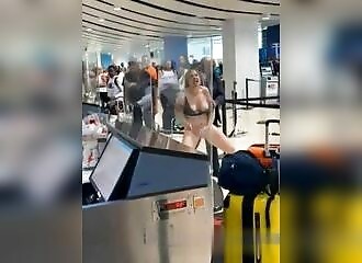 She freaks out and strips in an airport