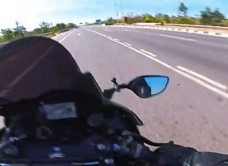 He narrowly avoids a truck at 299 km/h