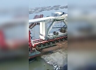 truck overturned by bridge girder in India