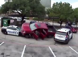 Thief trapped under stolen pickup after crashing into police car